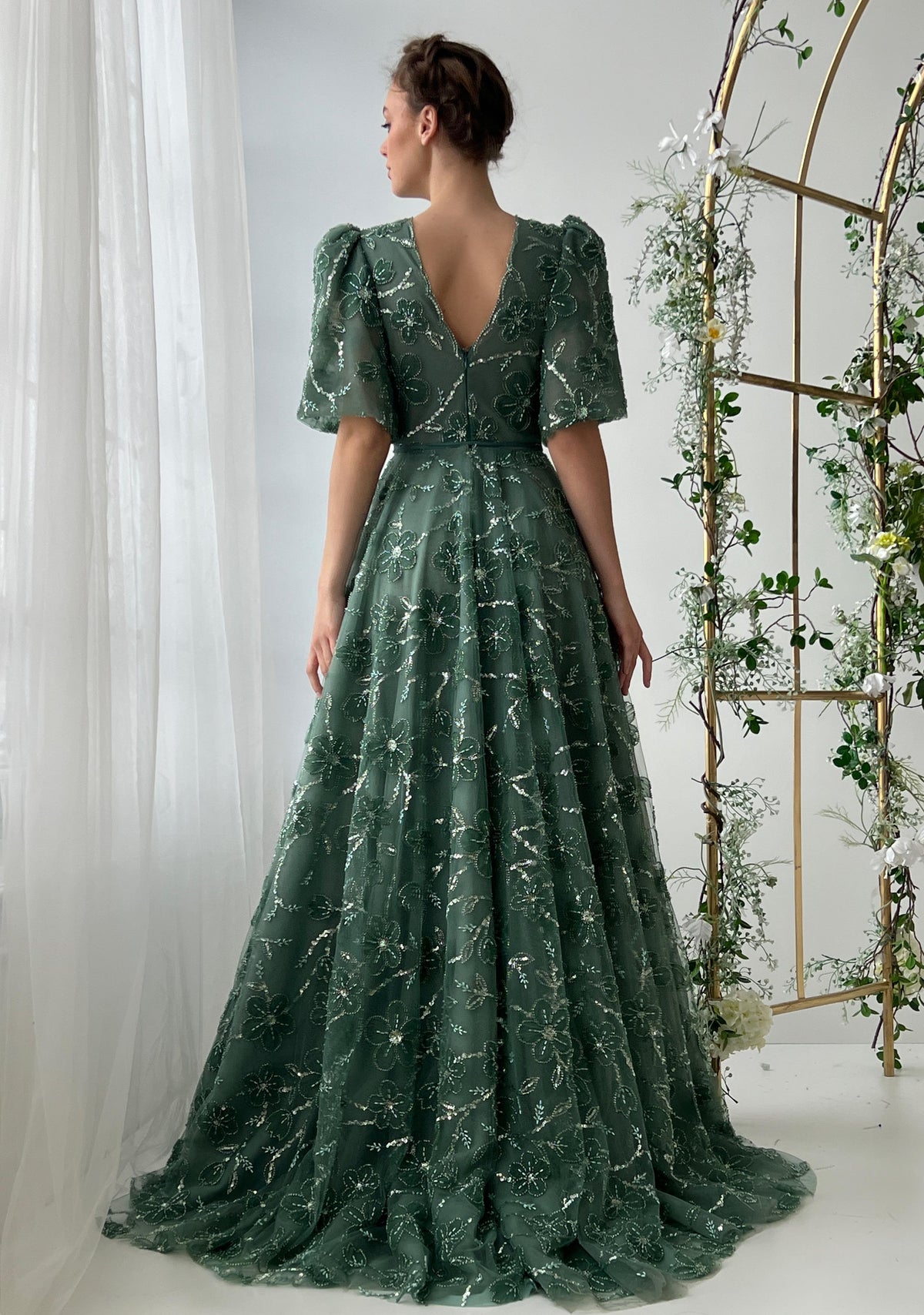 Green A-Line dress with v-neck, short sleeves and embroidery
