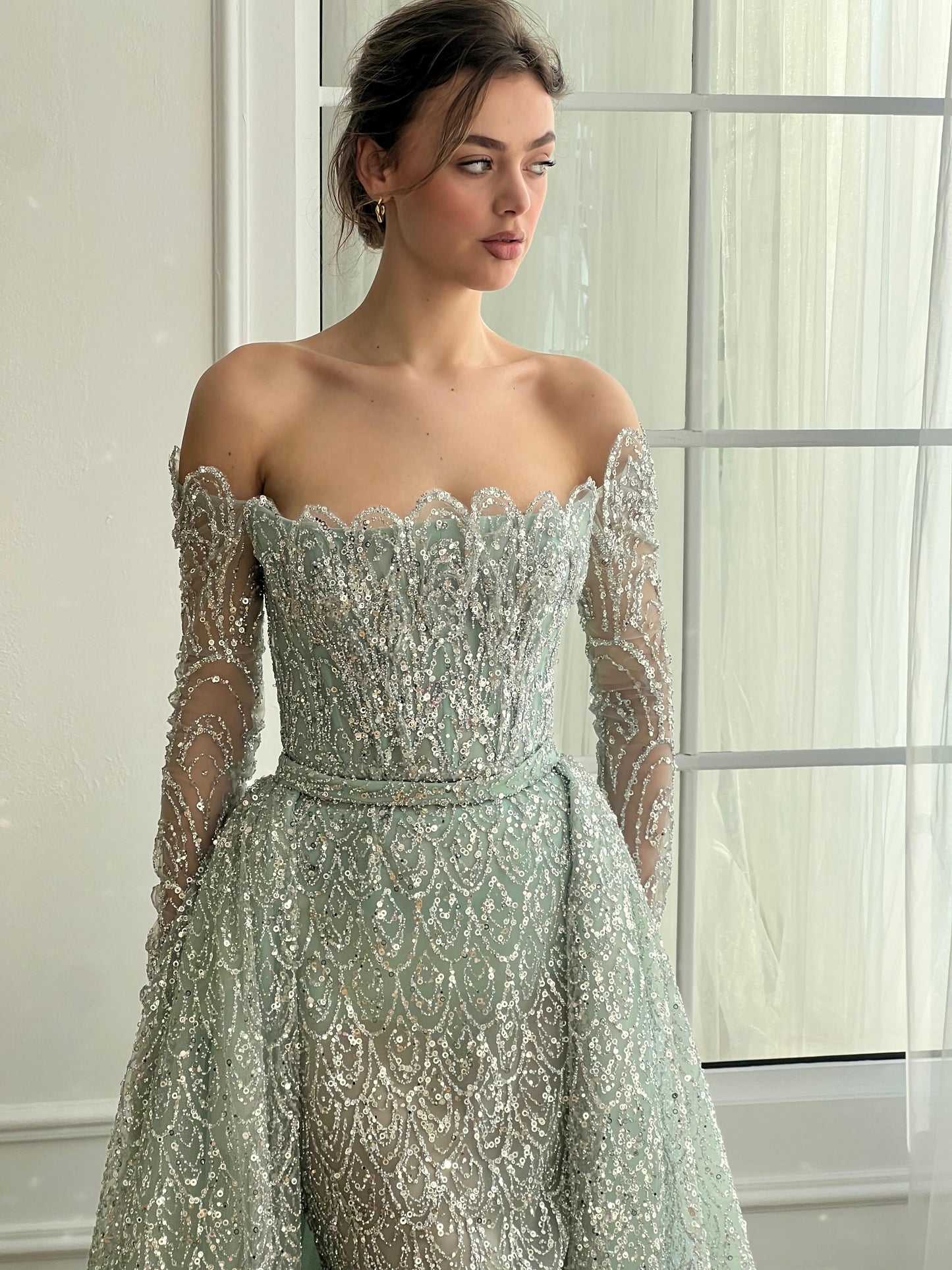 Mint A-Line dress with overskirt, long off the shoulder sleeves, embroidery and sequins