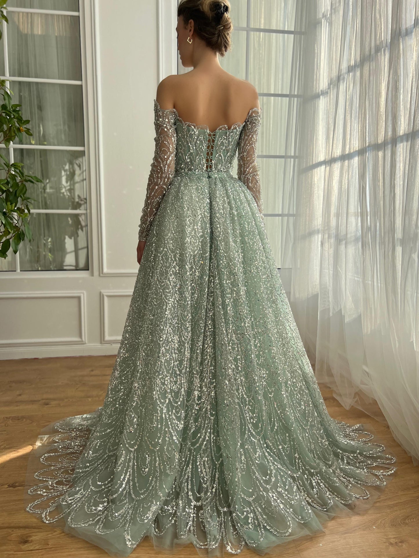 Mint A-Line dress with overskirt, long off the shoulder sleeves, embroidery and sequins