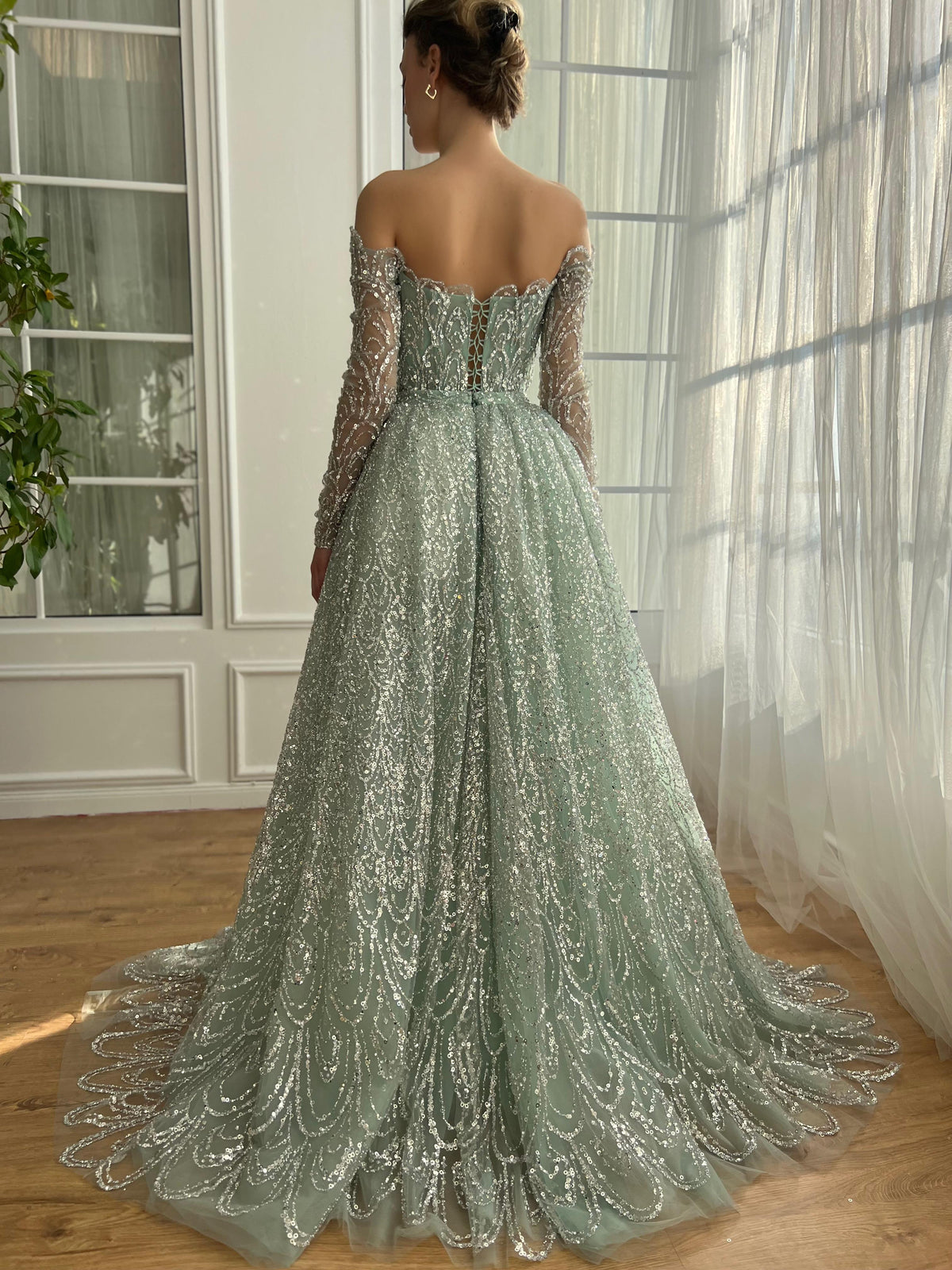 Mint A-Line dress with overskirt, long off the shoulder sleeves, embroidery and sequins