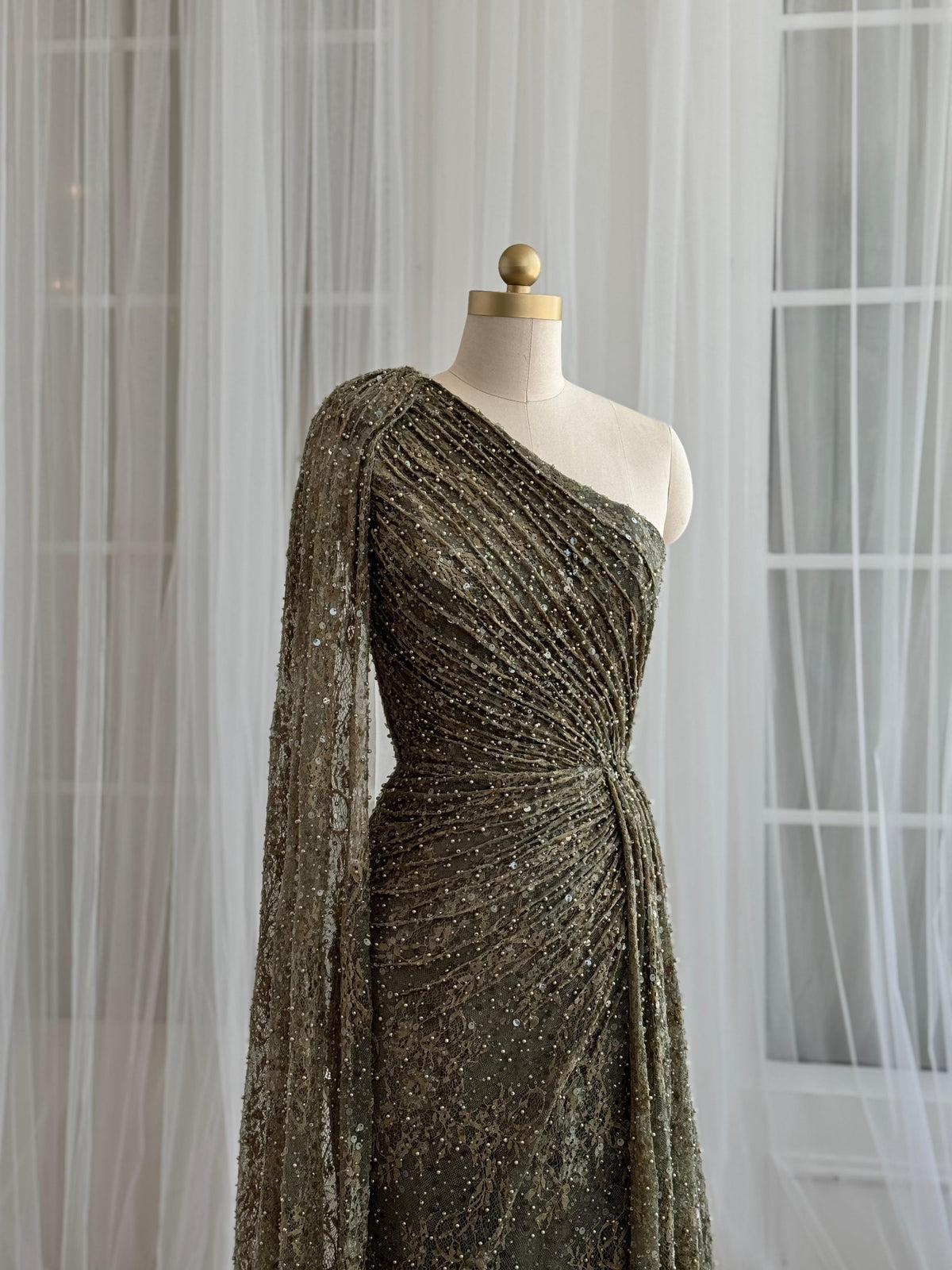 Green mermaid dress with one shoulder cape sleeve