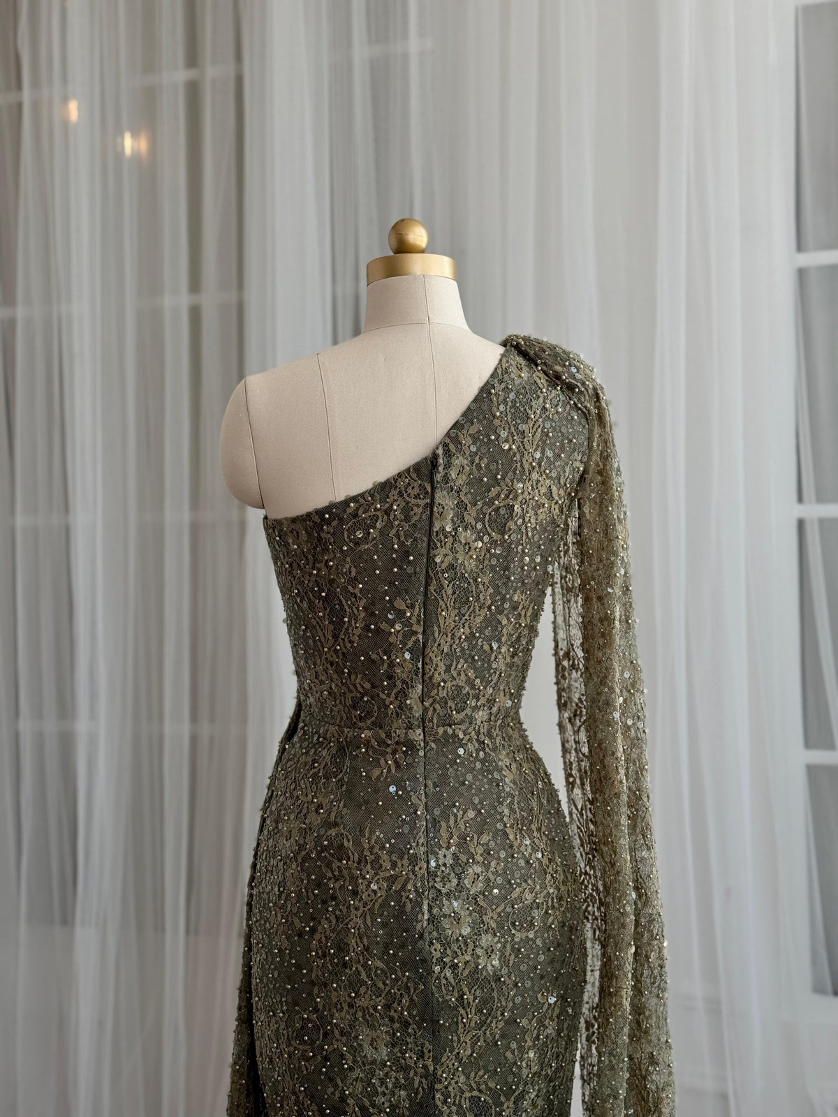 Green mermaid dress with one shoulder cape sleeve