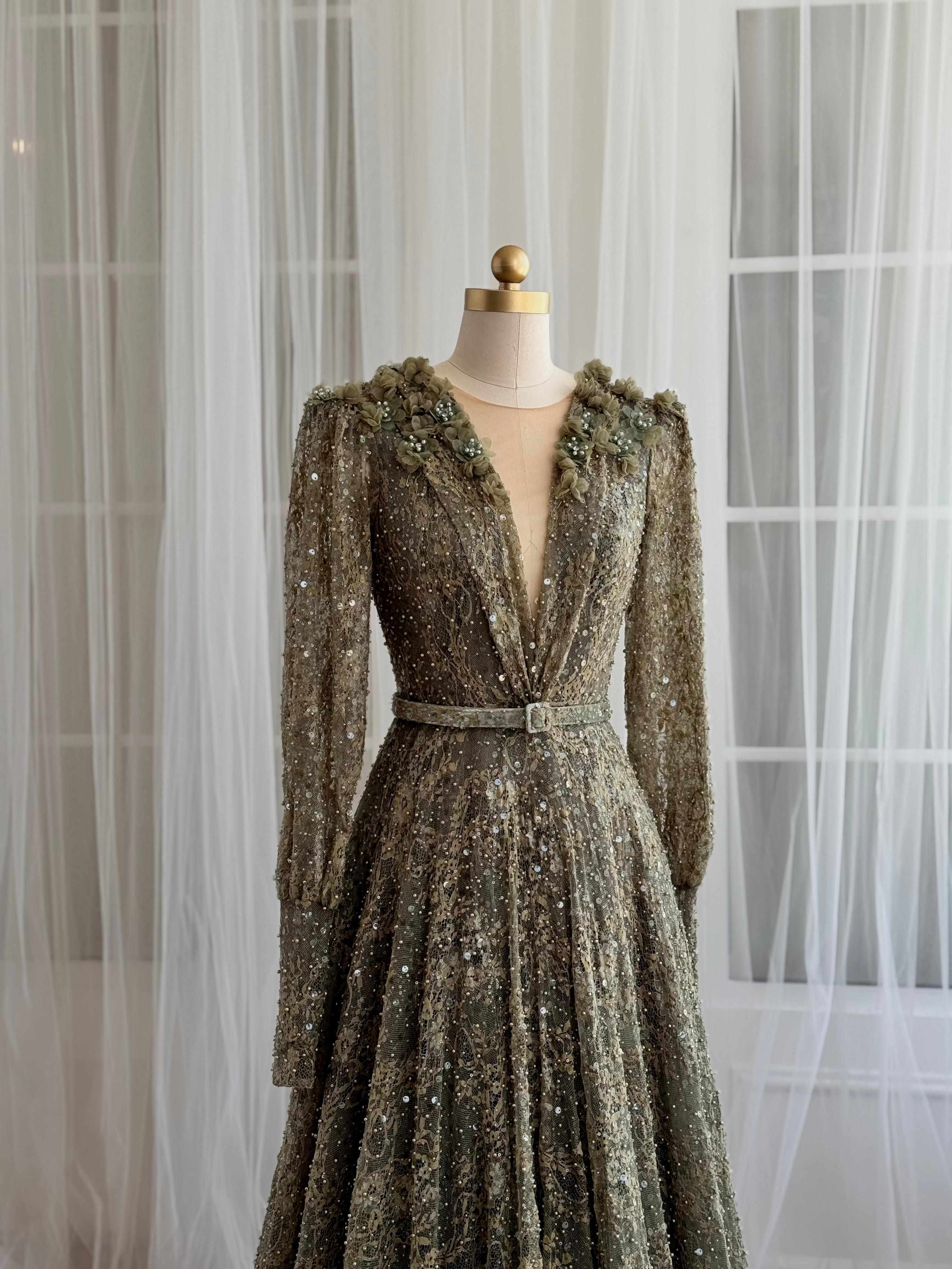 Green A-Line dress with v-neck, belt, long sleeves and embroidery