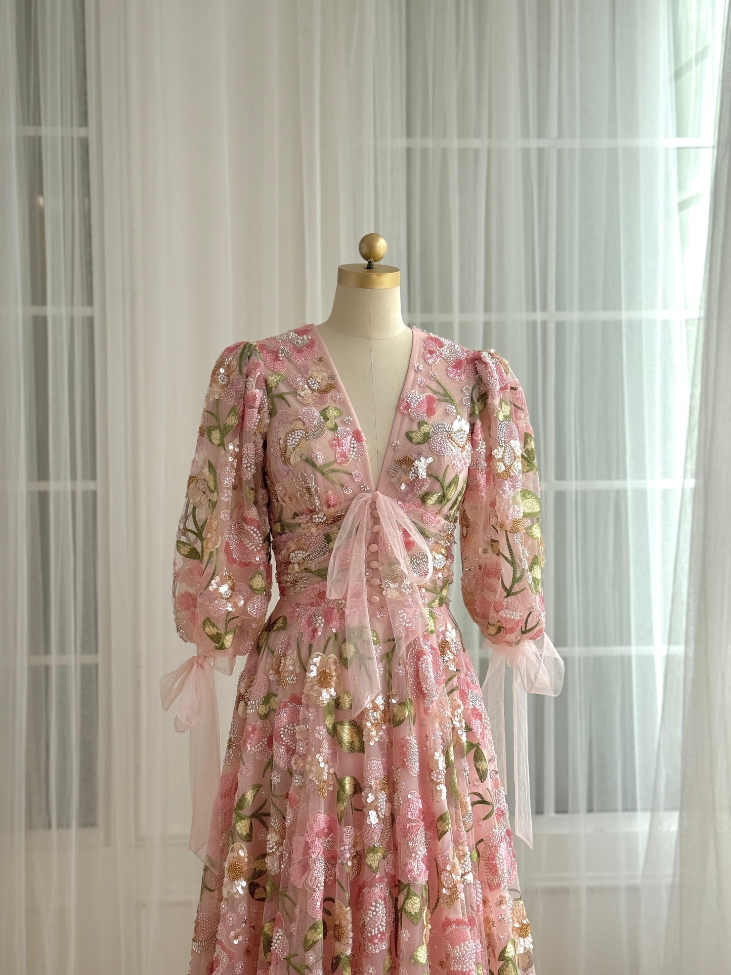 Pink A-Line dress with floral print, v-neck and long sleeves