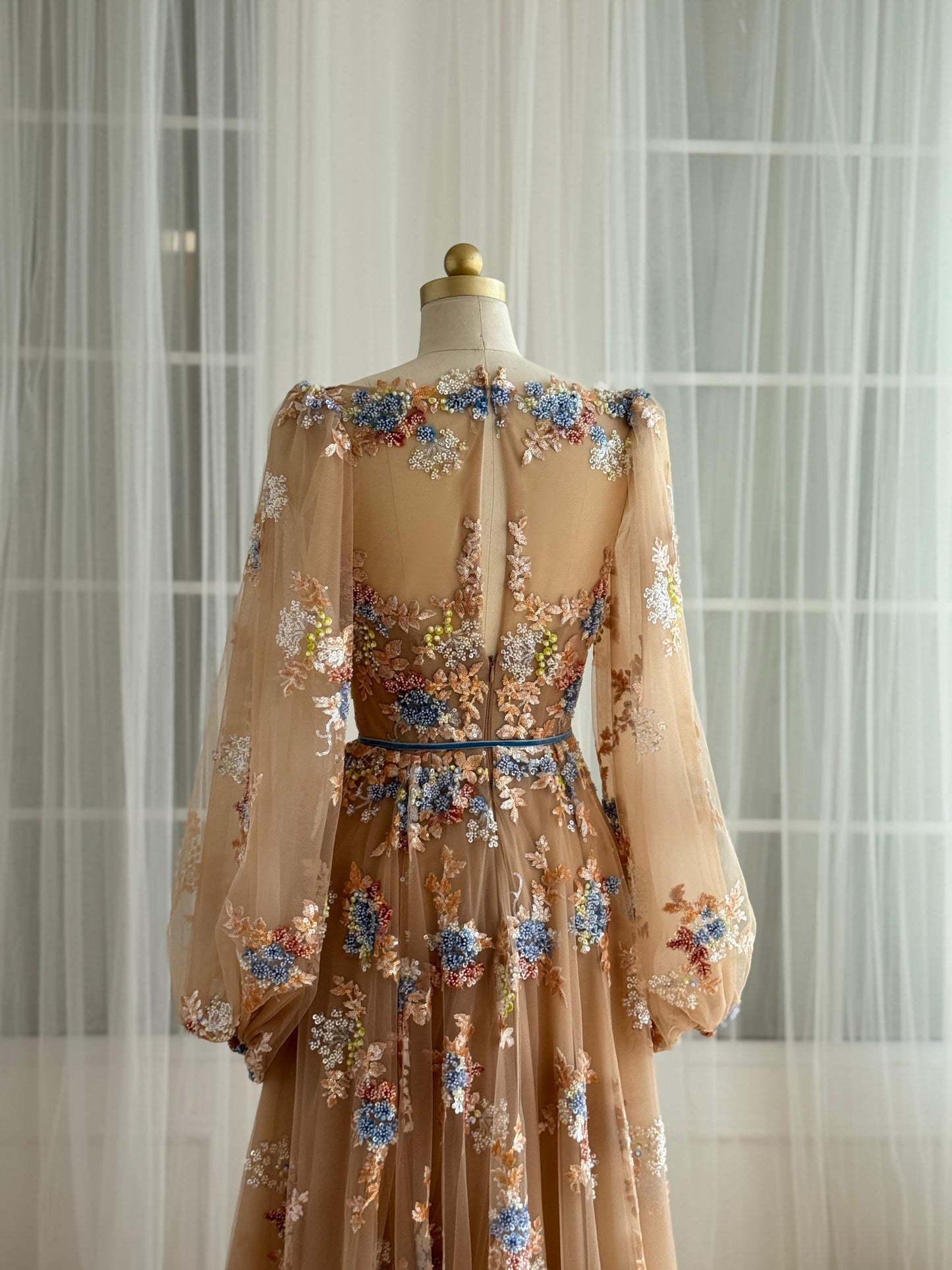 Brown A-Line dress with long sleeves and embroidered flowers