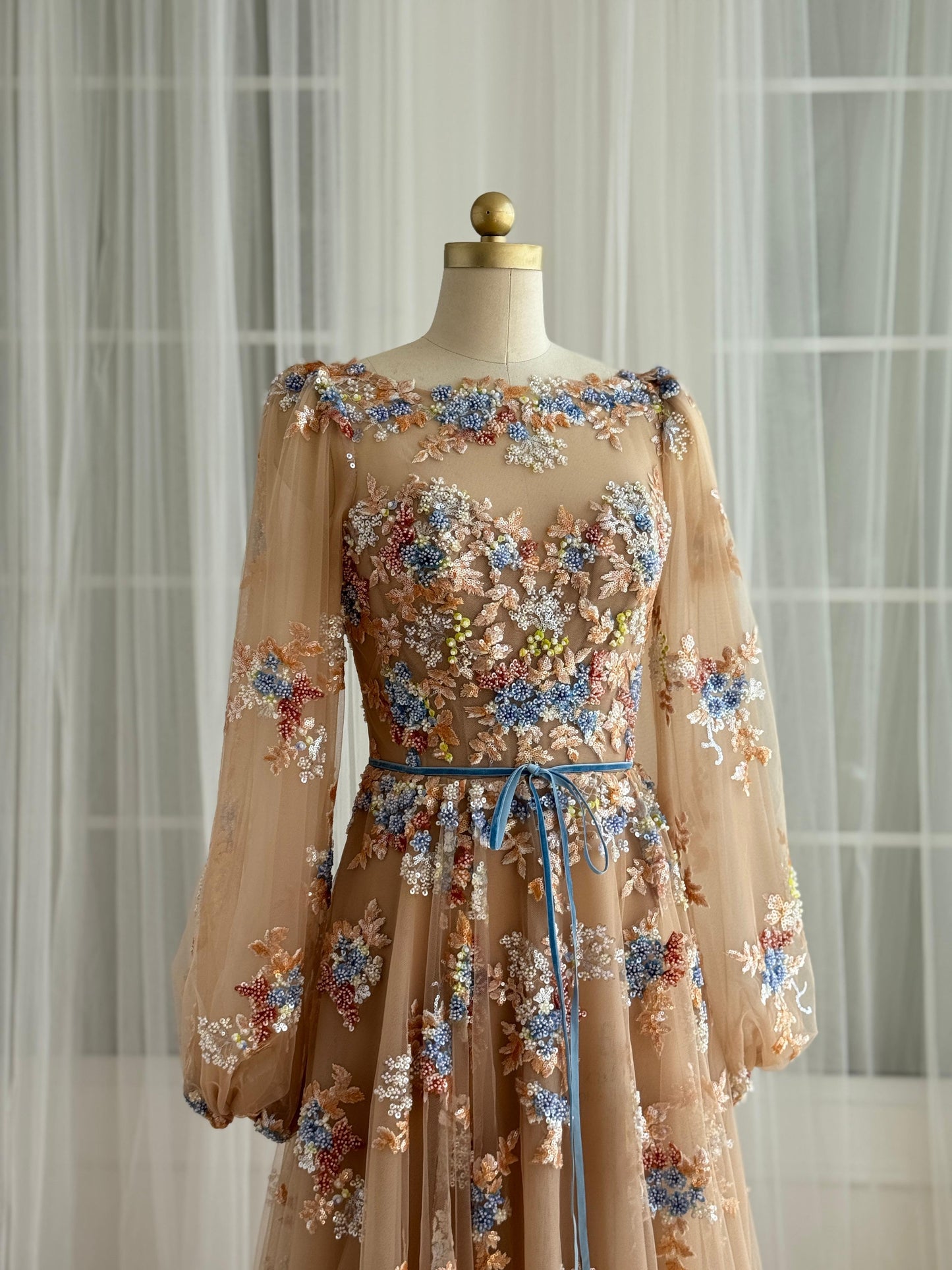 Brown A-Line dress with long sleeves and embroidered flowers