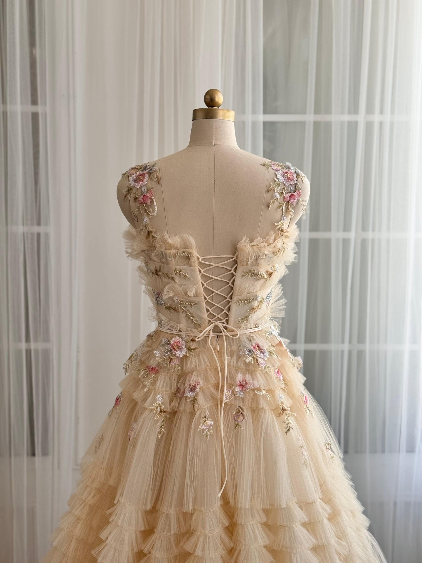 Beige A-Line dress with embroidery, floral straps and ruffles