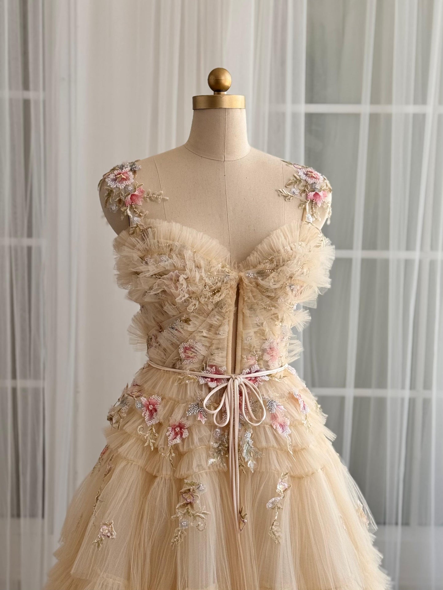 Beige A-Line dress with embroidery, floral straps and ruffles