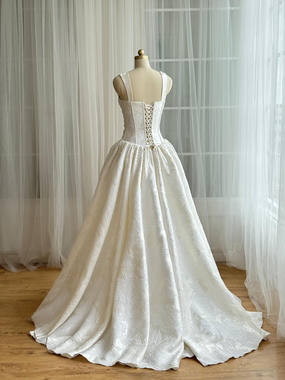 White A-Line bridal gown with straps, beading and embroidery