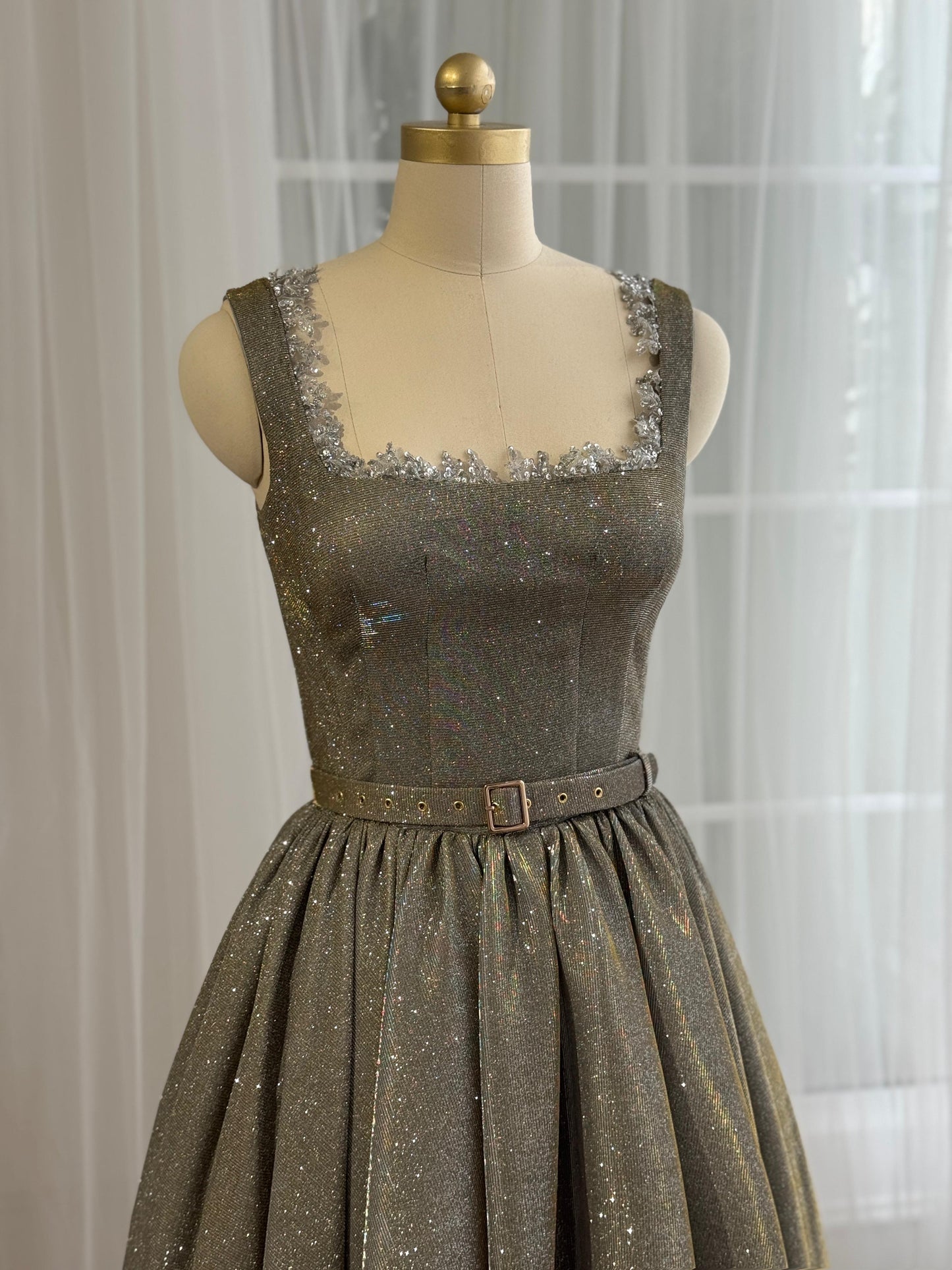 Grey midi dress with straps, belt, embroidery and sparkly fabric