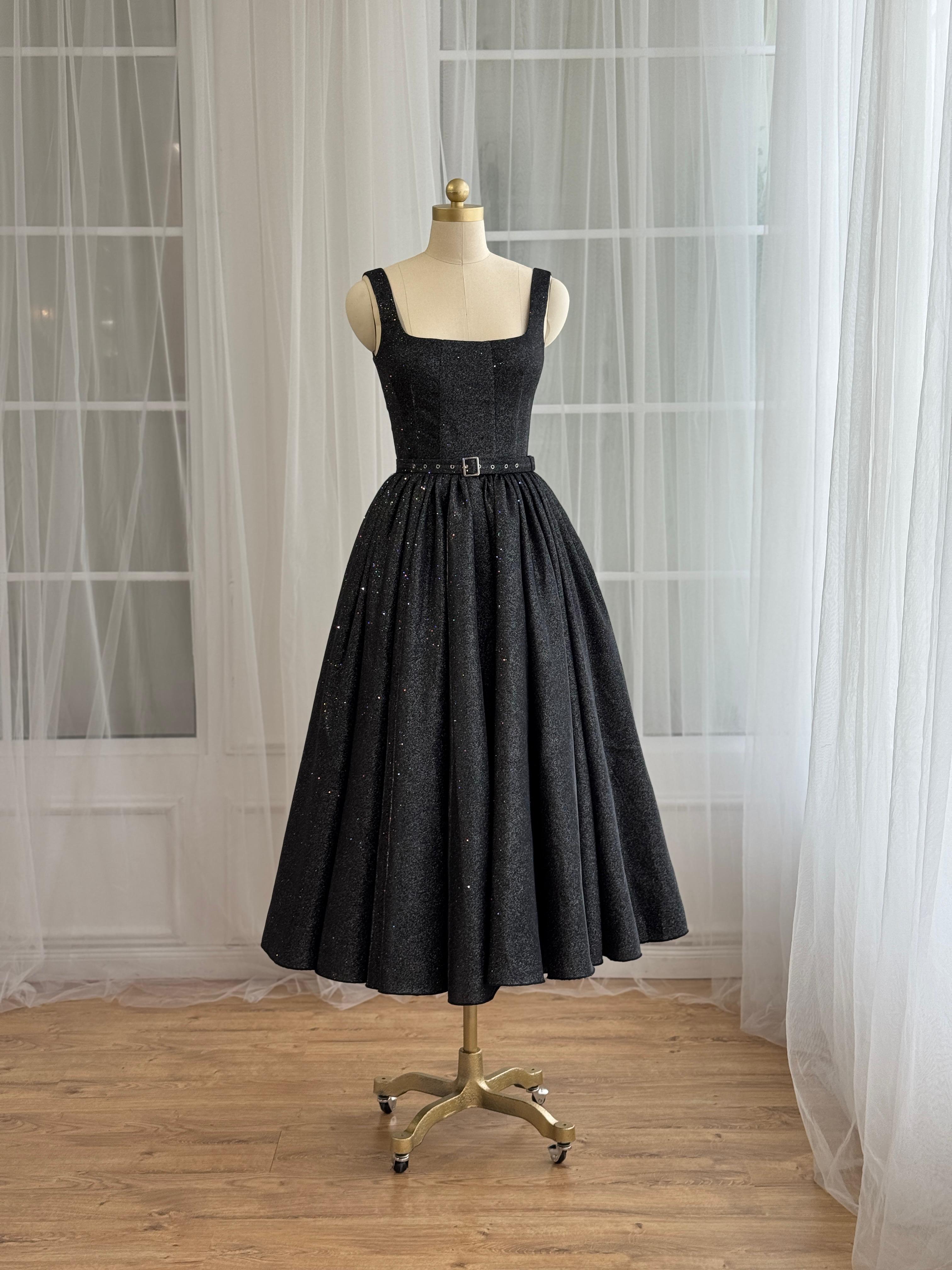 Black midi dress with straps, belt and sparkly fabric