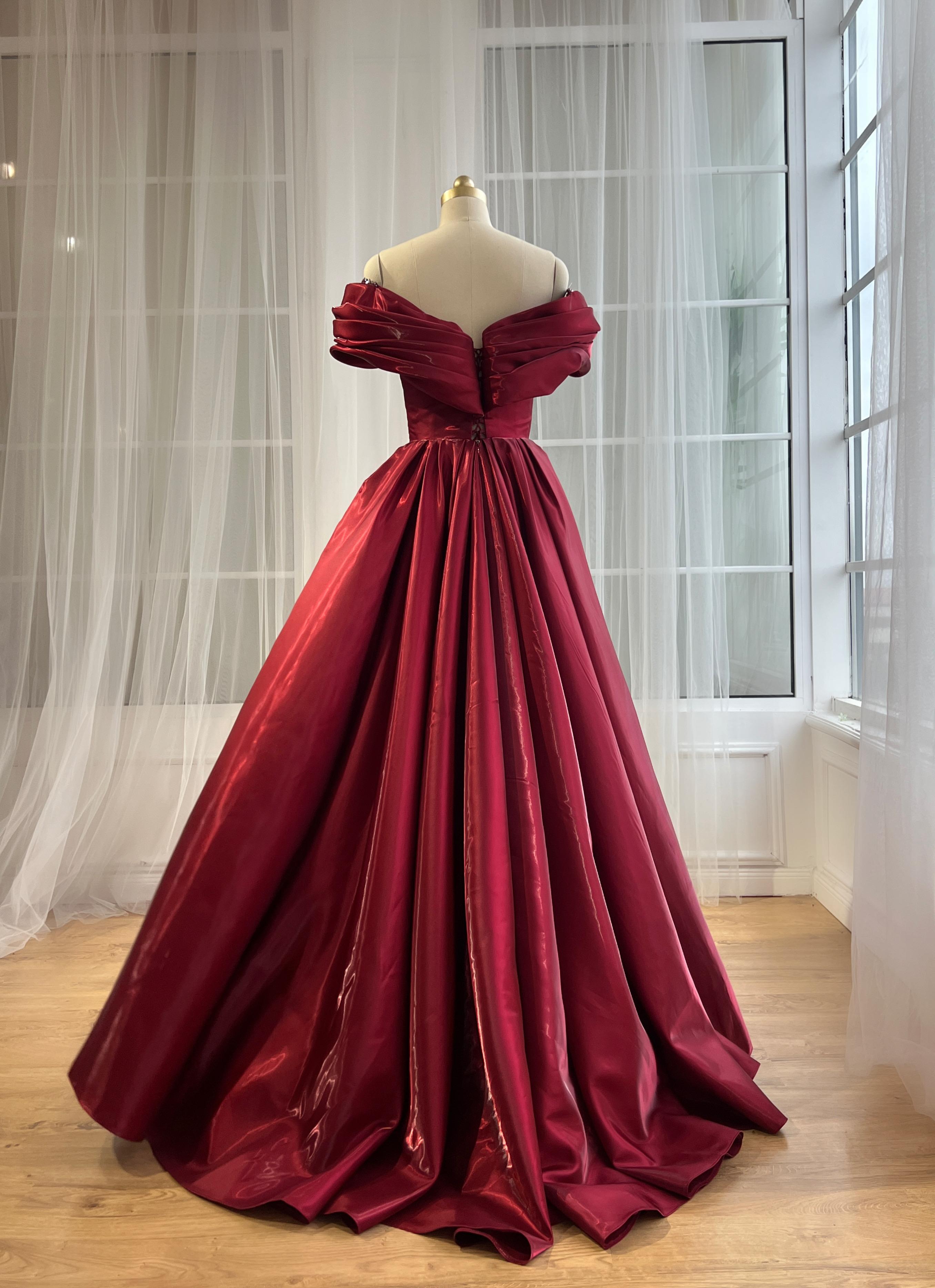 Red A-Line gown with off the shoulder sleeves and embroidery