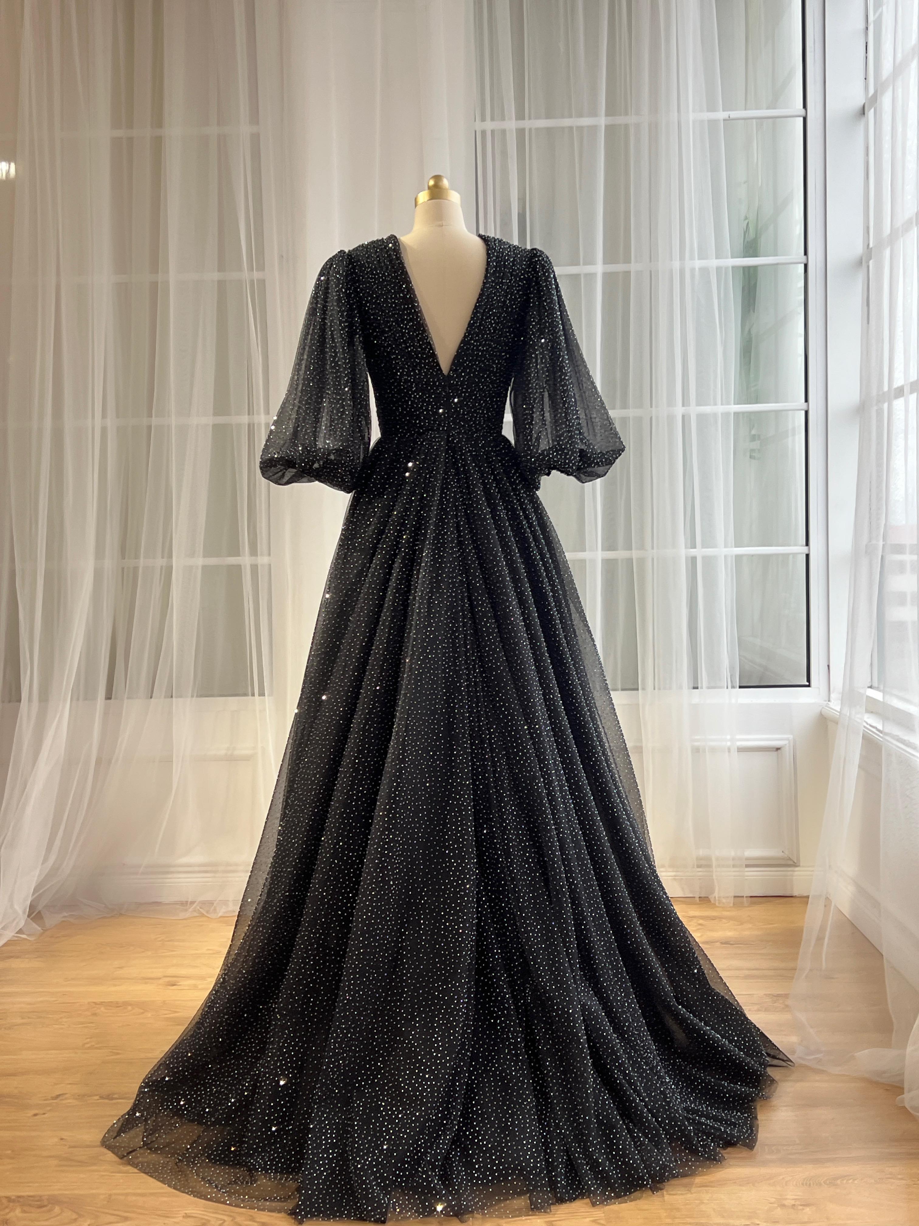 Black beaded A-Line gown with v-neck and long sleeves