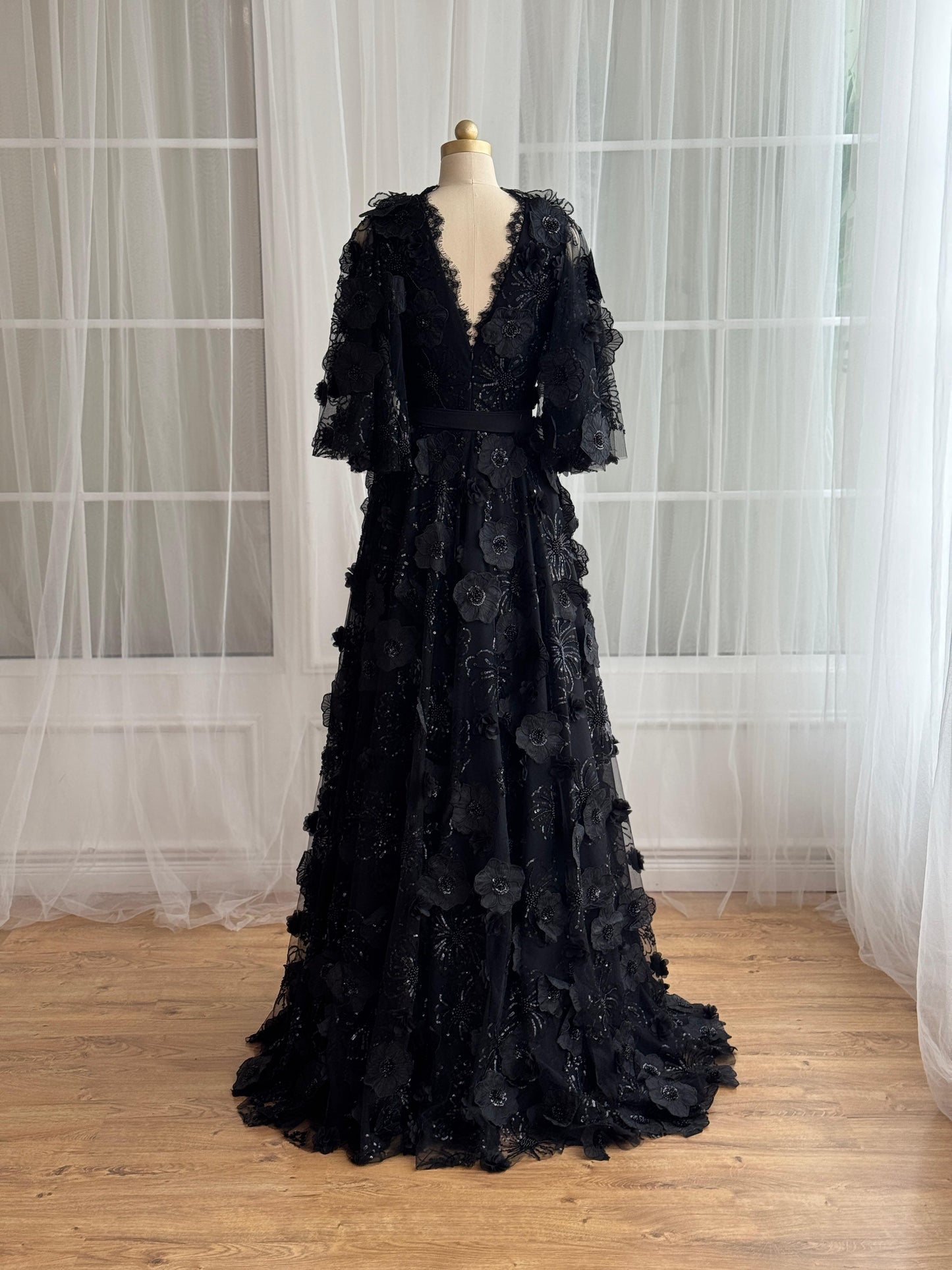 Black A-Line gown with v-neck, embroidery and short sleeves