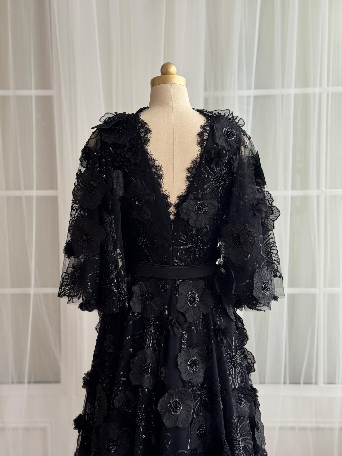 Black A-Line gown with v-neck, embroidery and short sleeves