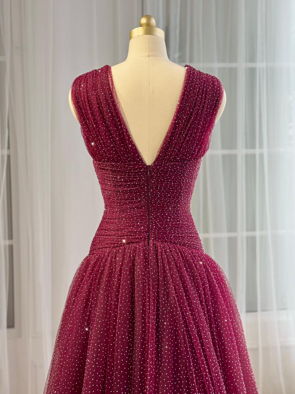 Red A-Line gown with beading, v-neck and no sleeves