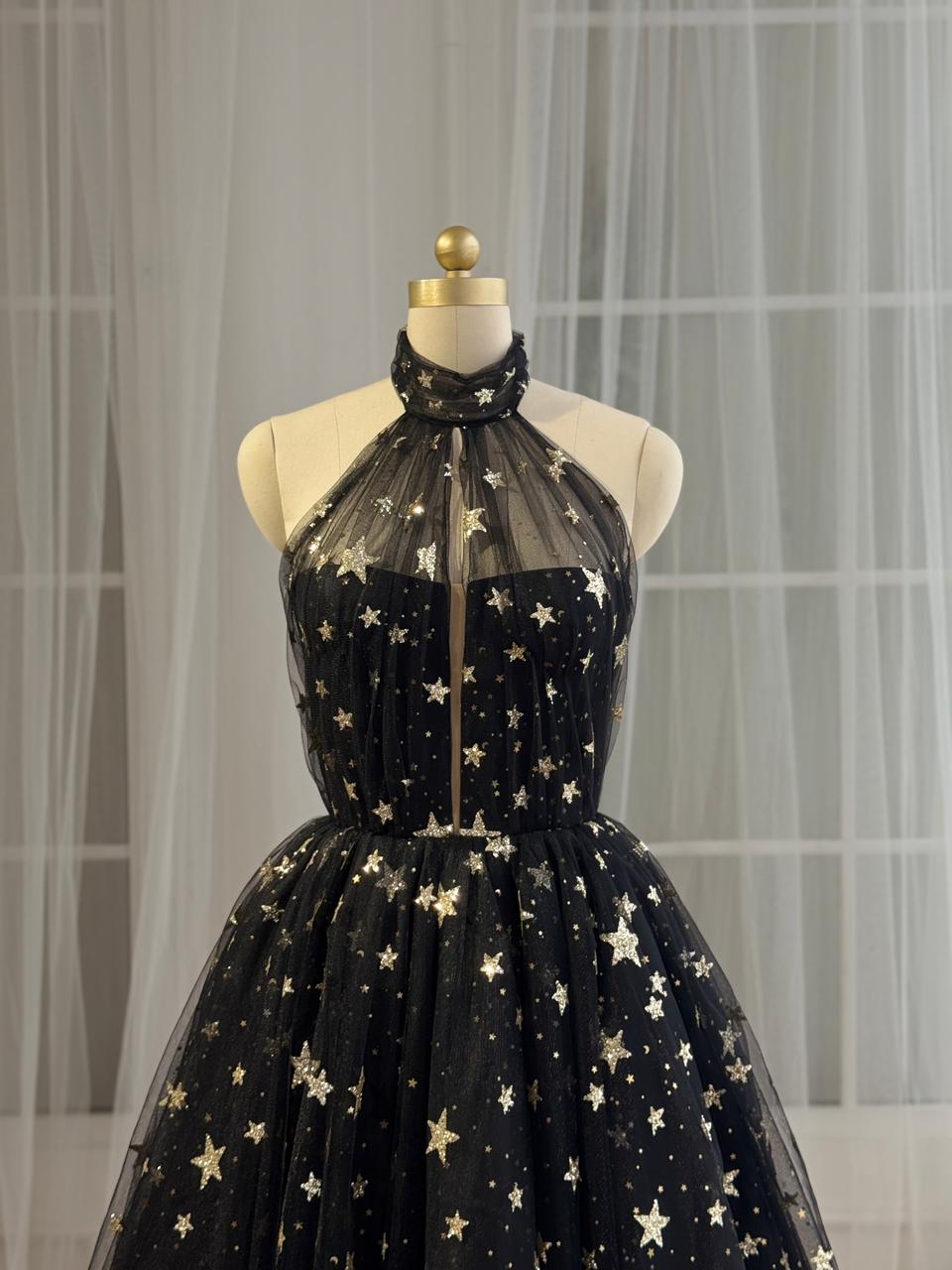 Black midi dress with starry fabric and no sleeves