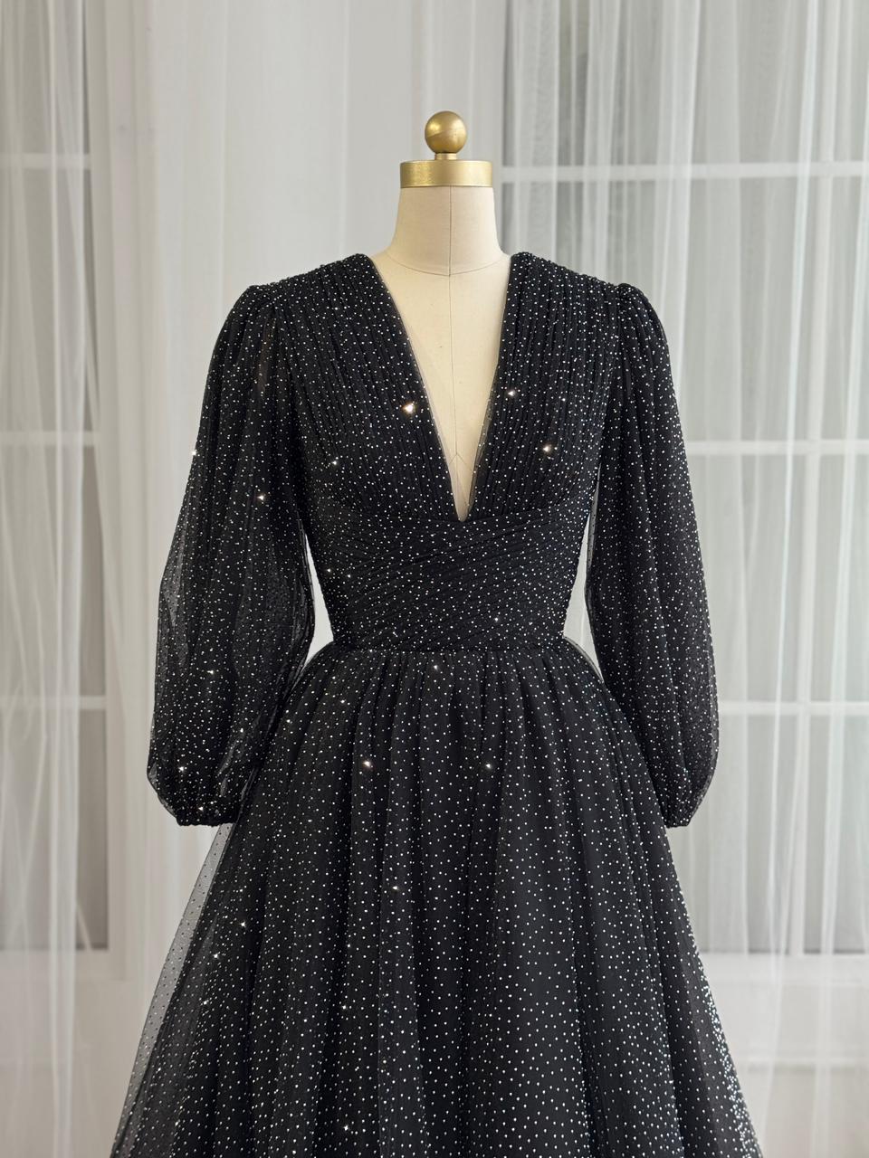 Black A-Line gown with beading, v-neck and long sleeves