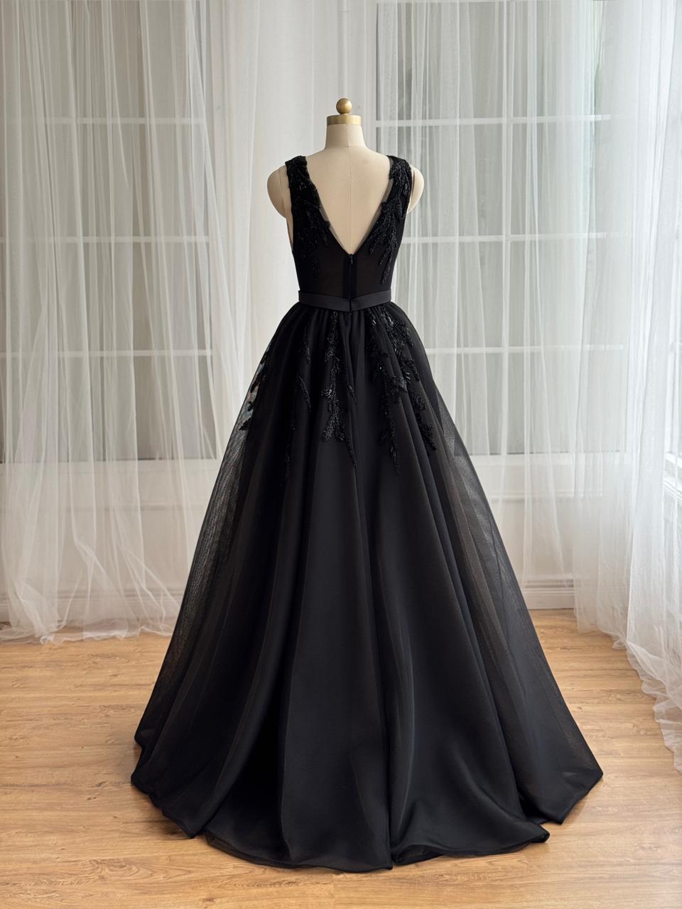 Black A_Line gown with overskirt, v-neck, embroidery and no sleeves