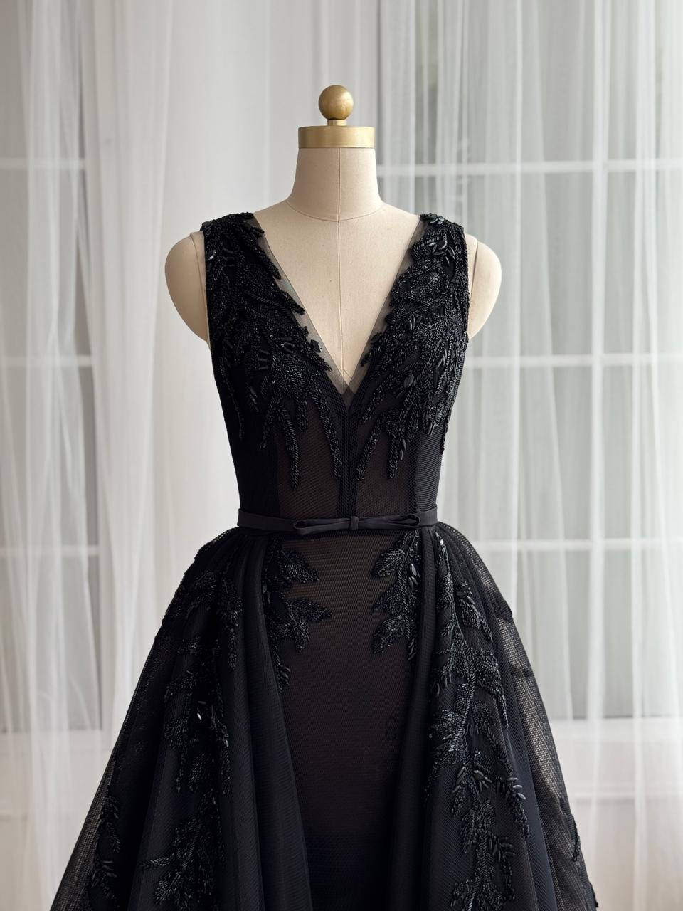 Black A_Line gown with overskirt, v-neck, embroidery and no sleeves