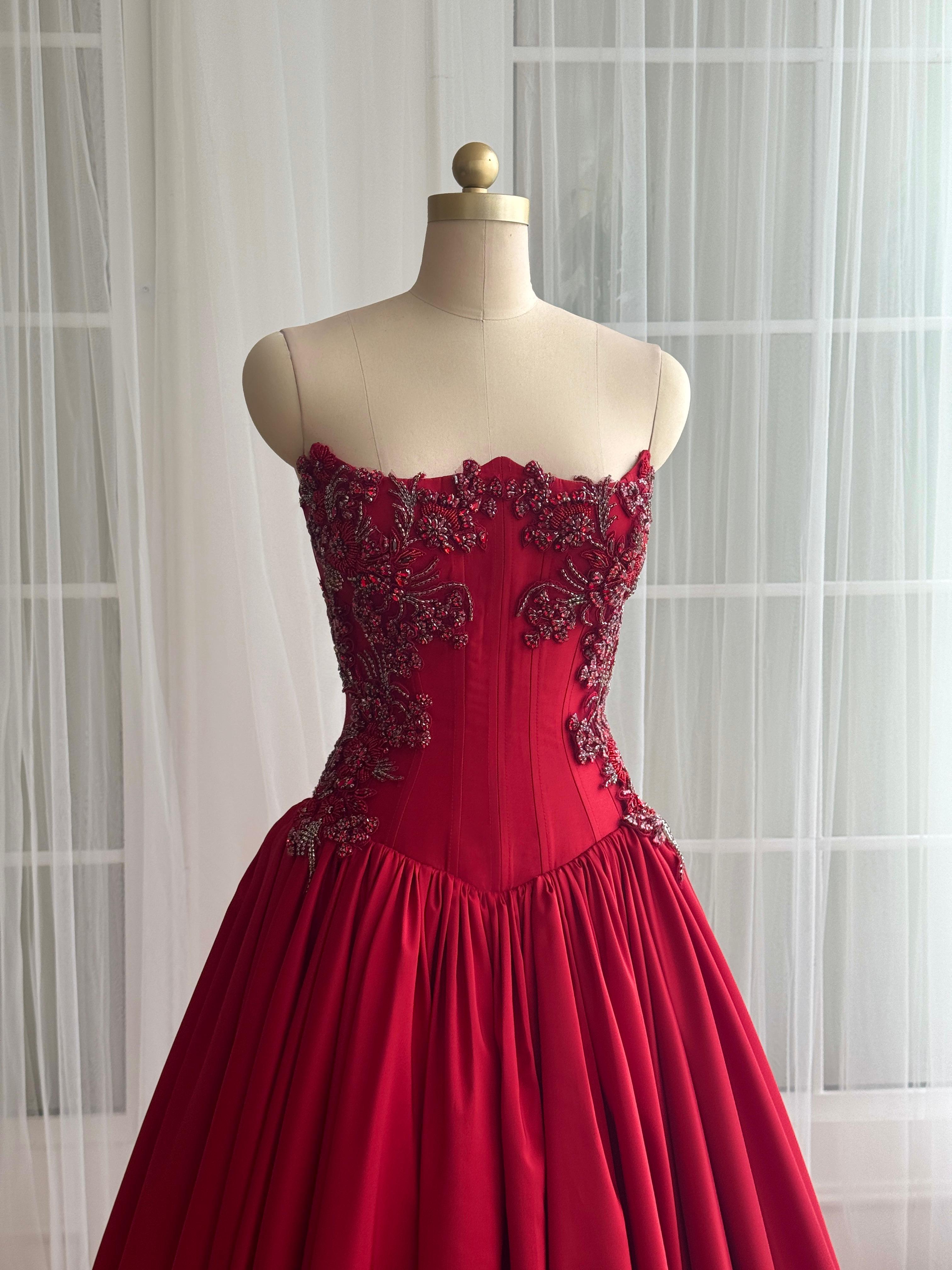 Red A-Line dress with embroidery and no sleeves