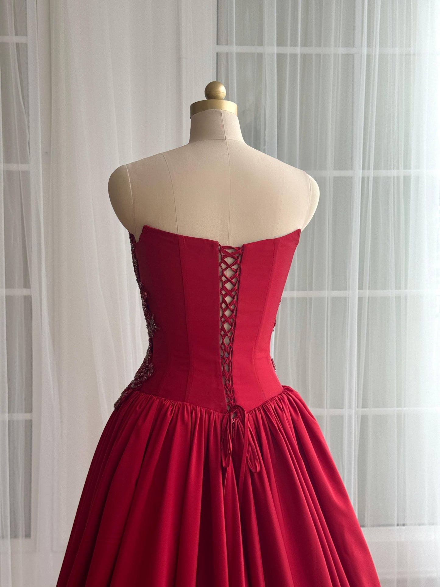 Red A-Line dress with embroidery and no sleeves