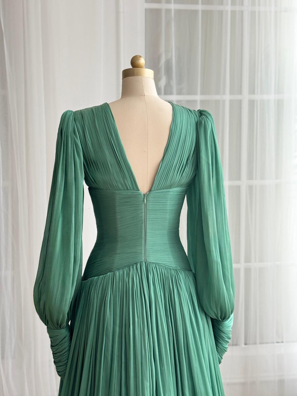 Green A-Line gown with long sleeves and. v-neck
