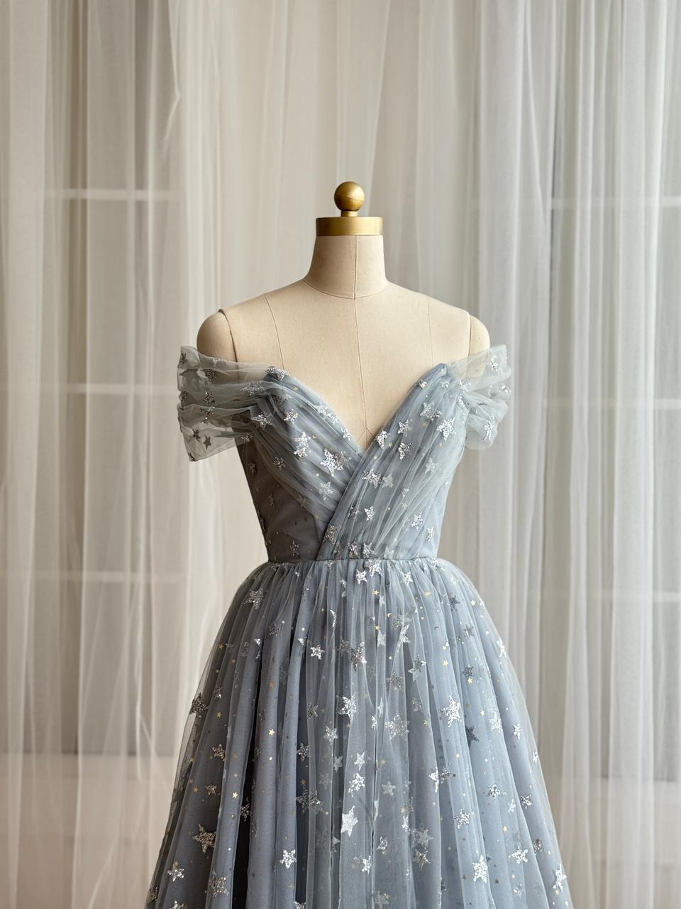 Silver midi dress with starry tulle fabric, v-neck and off the shoulder sleeves