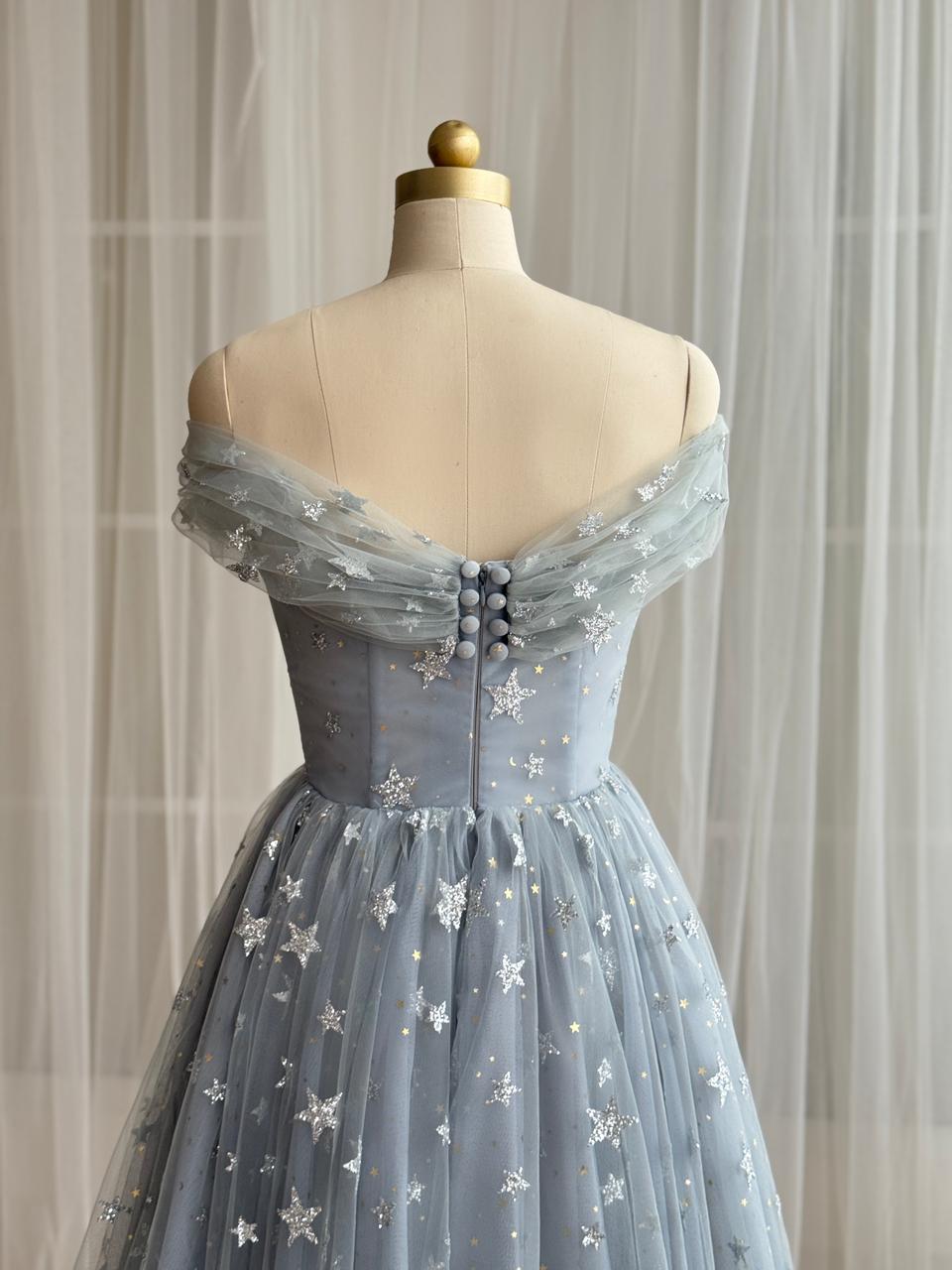 Silver midi dress with starry tulle fabric, embroidered bows, v-neck and off the shoulder sleeves