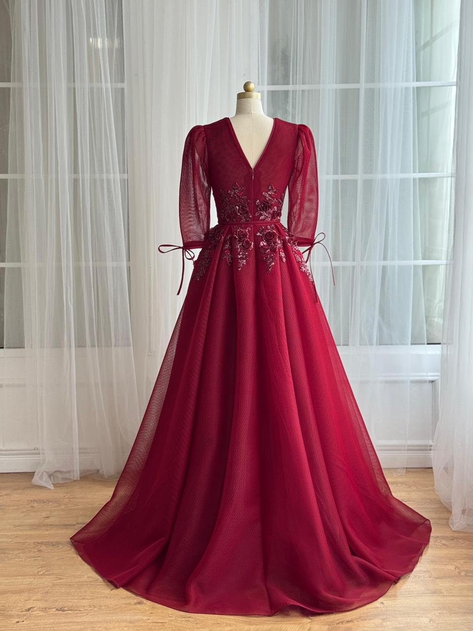 Red A-Line gown with long sleeves, v-neck and embroidery