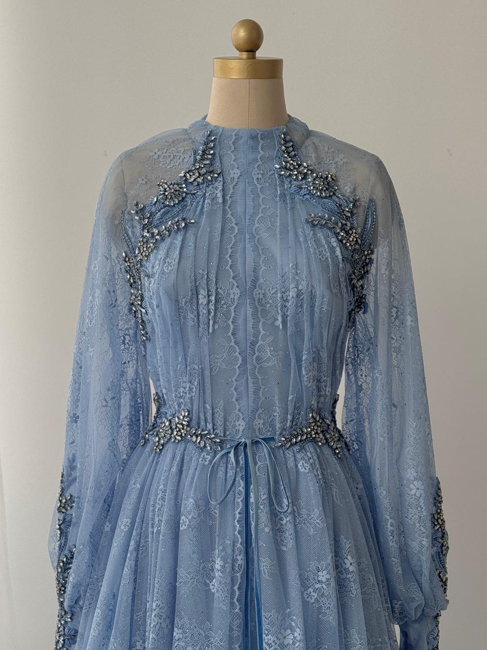 Blue A-Line gown with long sleeves, v-neck and embroidery