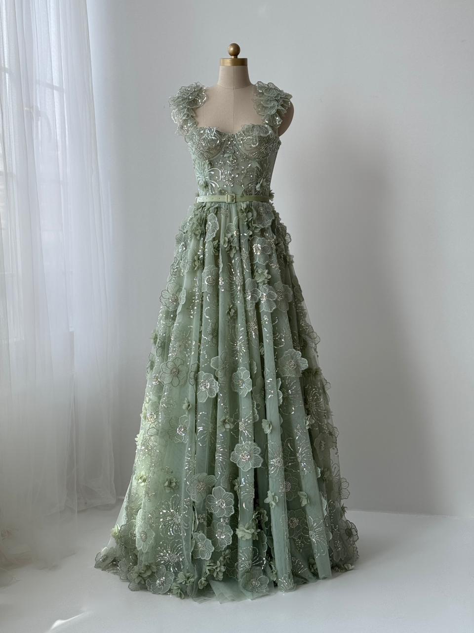 Green A-Line dress with spaghetti straps, belt and embroidery