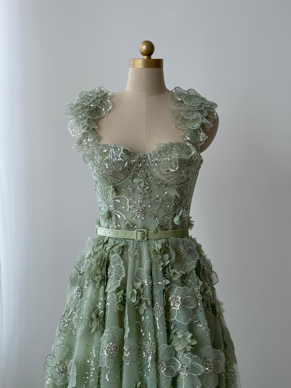Green A-Line dress with spaghetti straps, belt and embroidery