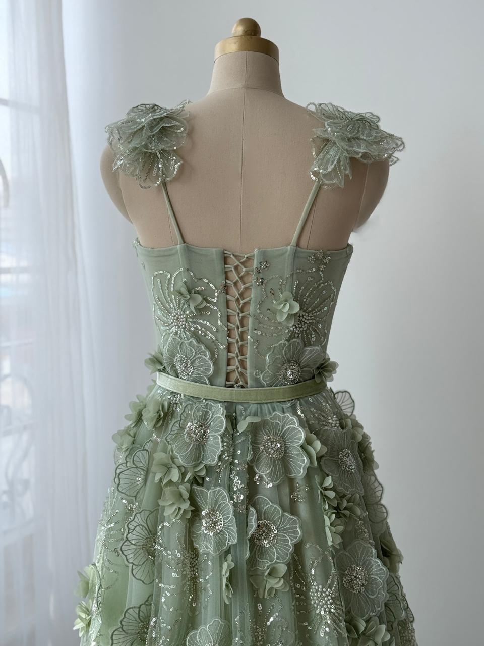 Green A-Line dress with spaghetti straps, belt and embroidery
