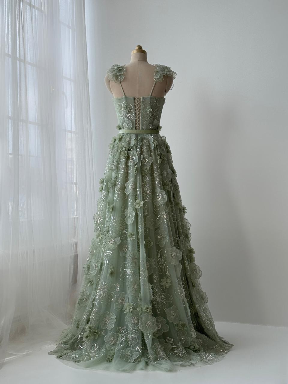 Green A-Line dress with spaghetti straps, belt and embroidery