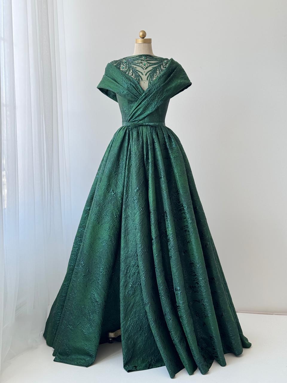 Green A-Line gown with shawl, short sleeves and brocade fabric