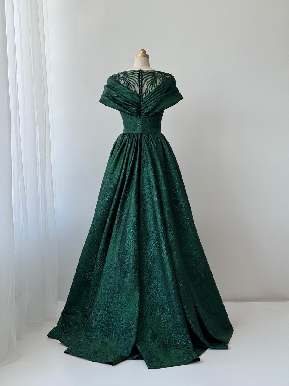 Green A-Line gown with shawl, short sleeves and brocade fabric