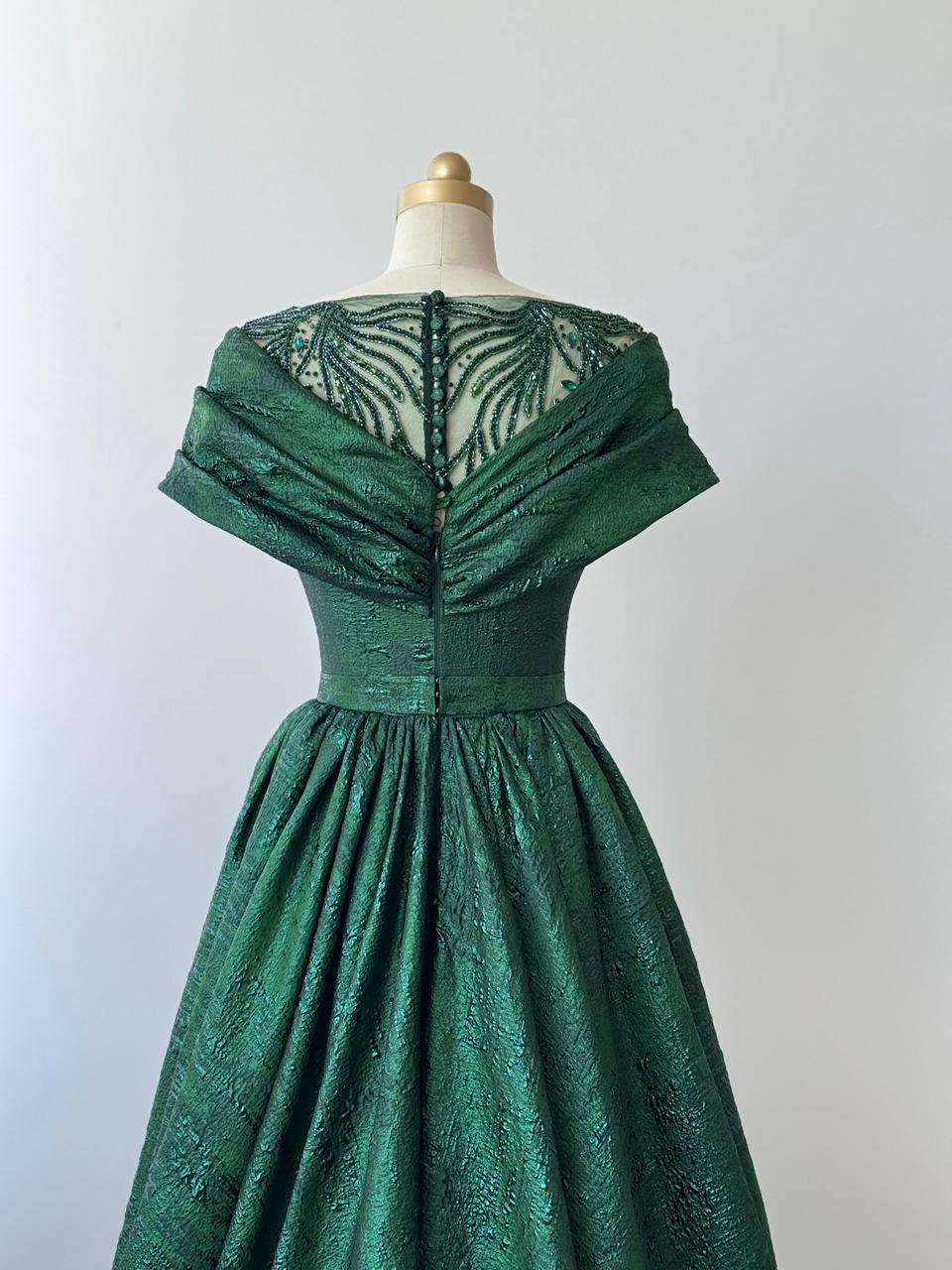Green A-Line gown with shawl, short sleeves and brocade fabric