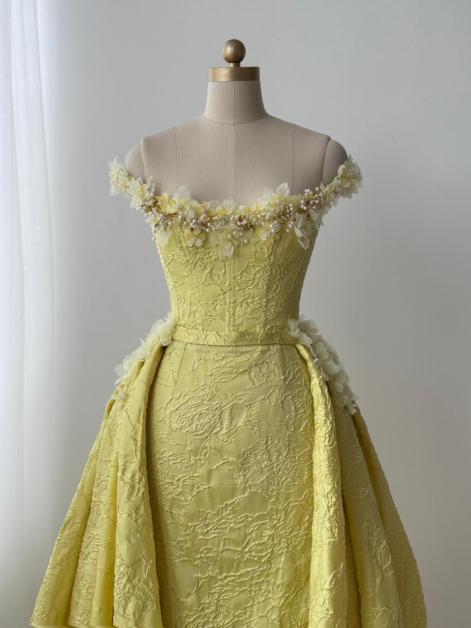 Yellow A-Line gown with overskirt, off the shoulder sleeves and embroidery