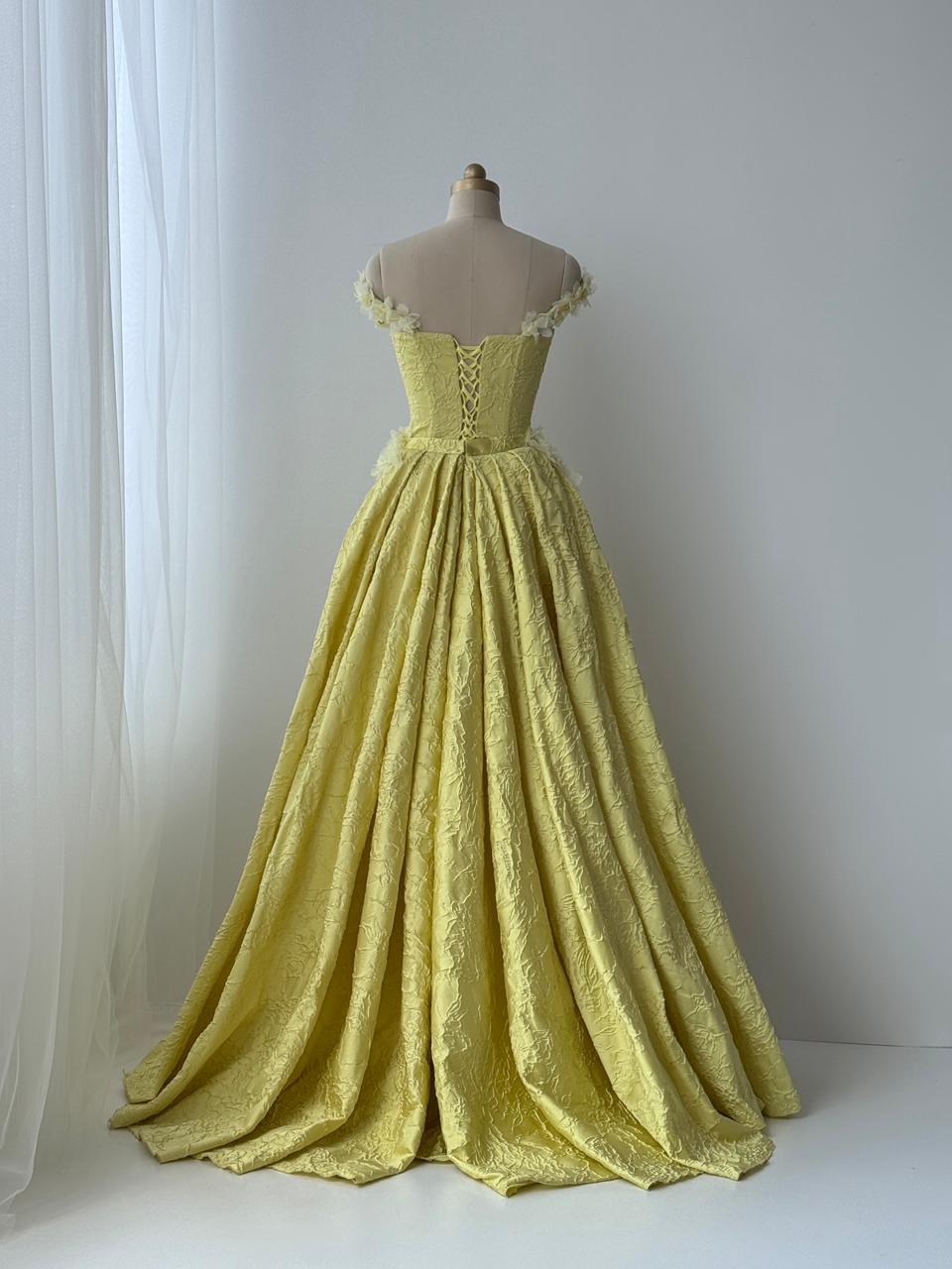 Yellow A-Line gown with overskirt, off the shoulder sleeves and embroidery