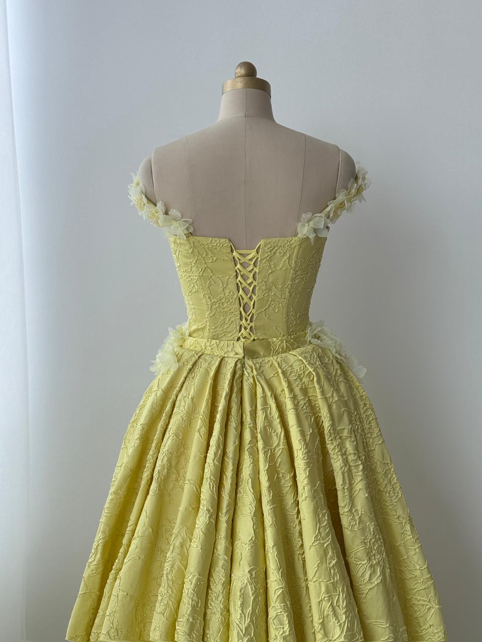 Yellow A-Line gown with overskirt, off the shoulder sleeves and embroidery