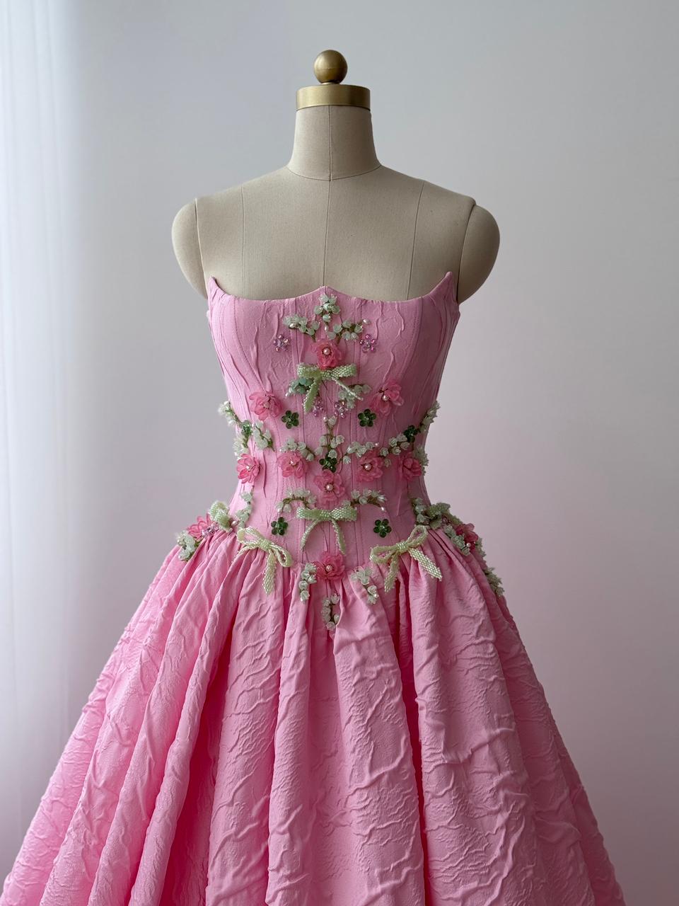 Pink A-Line gown with brocade fabric, embroidery and no sleeves