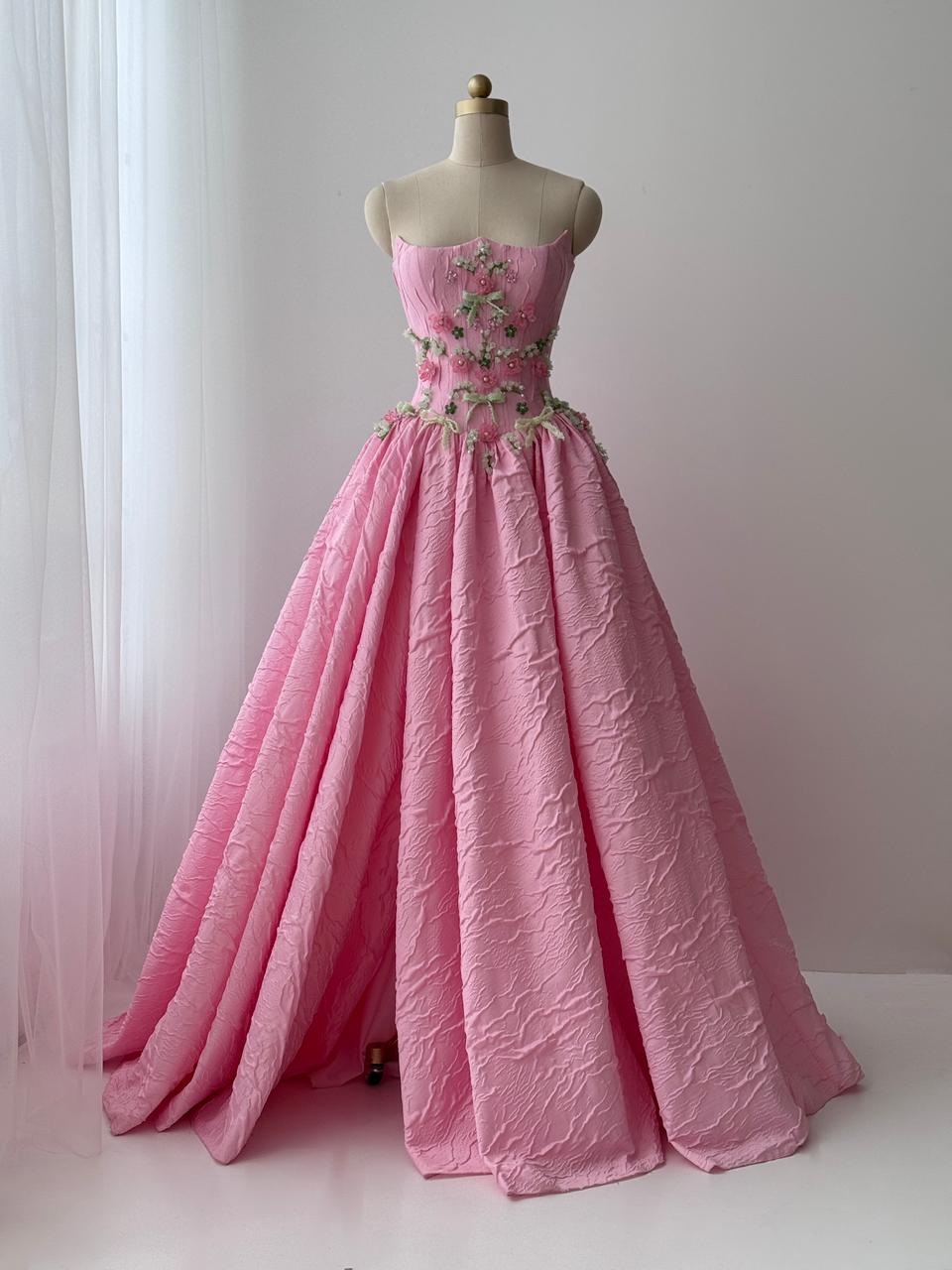 Pink A-Line gown with brocade fabric, embroidery and no sleeves