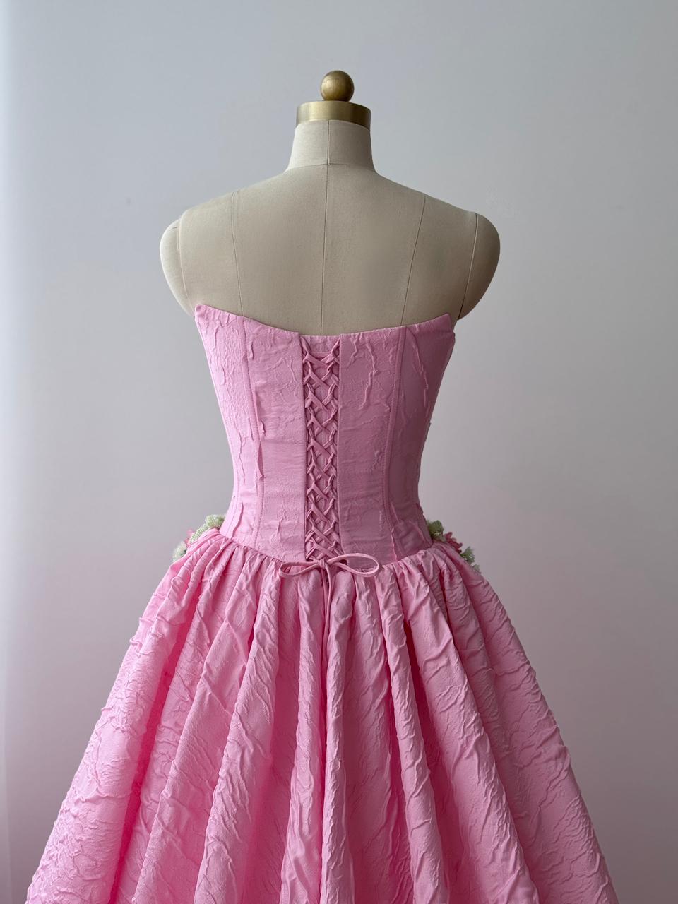 Pink A-Line gown with brocade fabric, embroidery and no sleeves