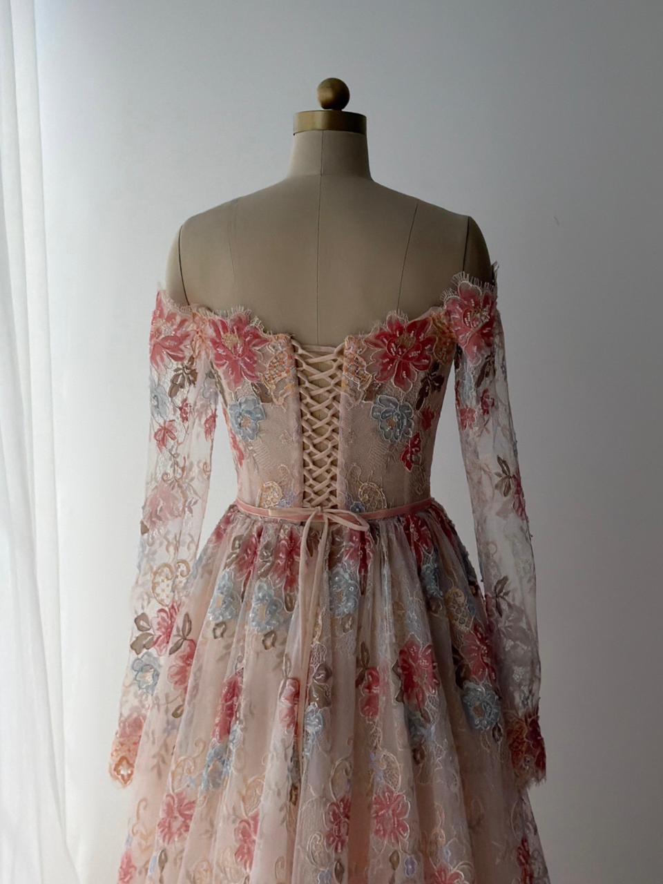 Pink A-Line gown with long off the shoulder sleeves, lace and embroidery