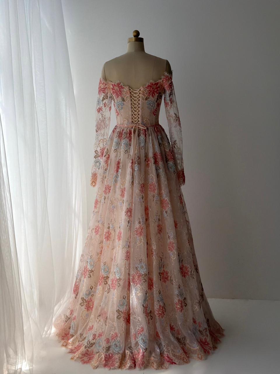 Pink A-Line gown with long off the shoulder sleeves, lace and embroidery