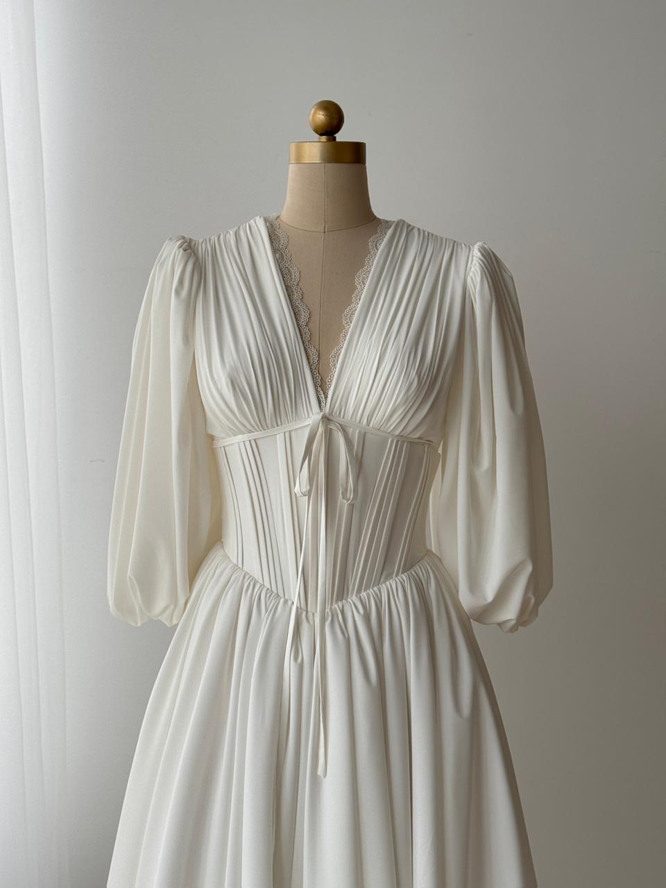 White bridal midi dress with short sleeves, v-neck and embroidered lace