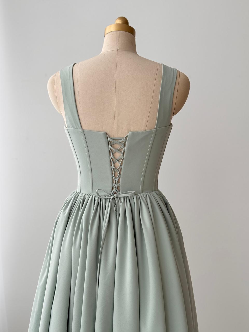 Grey midi dress with embroidered bow and straps