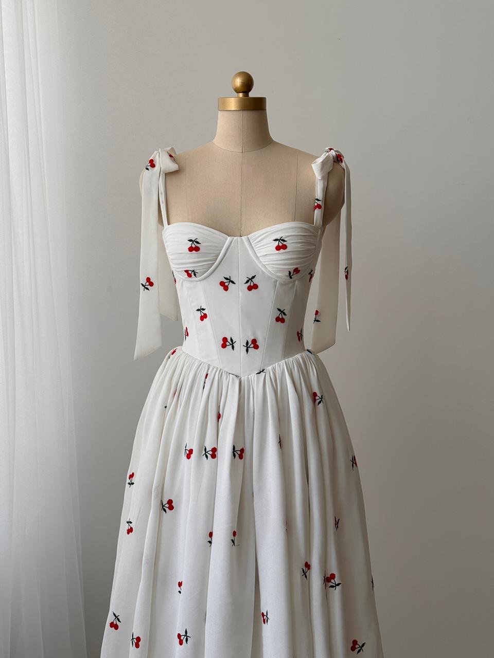 White midi dress with bow straps and cherries