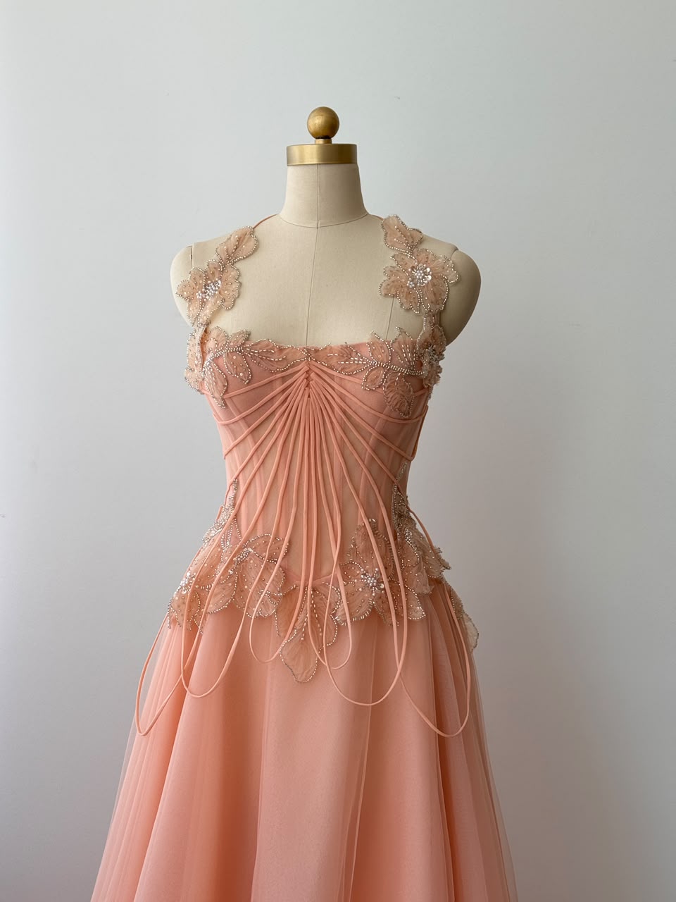 Peach A-Line gown with straps and embroidery